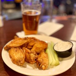 The Cambridge House Brew Pub - 6 piece bone in buffalo wings and an ipa - nice but could have used a bit more sauce