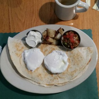 Common Place Eatery - Ranchos Huevos - Two poached eggs on chili and cheese filled quesadilla. Complimented with salsa and sour cream and side of home fries. - Breakfast & Brunch Near Me - Bennington, New Hampshire