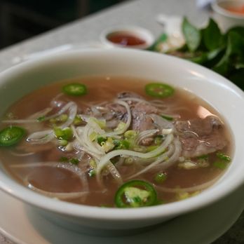 Pho Kapahulu - a bowl of soup and chopsticks - Vietnamese Near Me - Honolulu, Hawaii Pho Kapahulu - a bowl of soup and chopsticks - Vietnamese Near Me - Honolulu, Hawaii