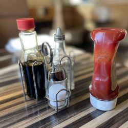 Soy sauce, vinegar, salt, pepper, ketchup.