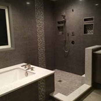 Perfect Cutz Tile - a bathroom with a walk in shower - General Contractors Near Me - Montgomery, New York