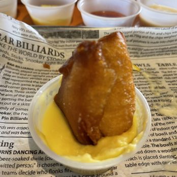 TY Fish & Chips - Mango creamed sauce is paired with the donuts for a delicious dessert - Fish & Chips Near Me - Sandy, Utah TY Fish & Chips - Mango creamed sauce is paired with the donuts for a delicious dessert - Fish & Chips Near Me - Sandy, Utah