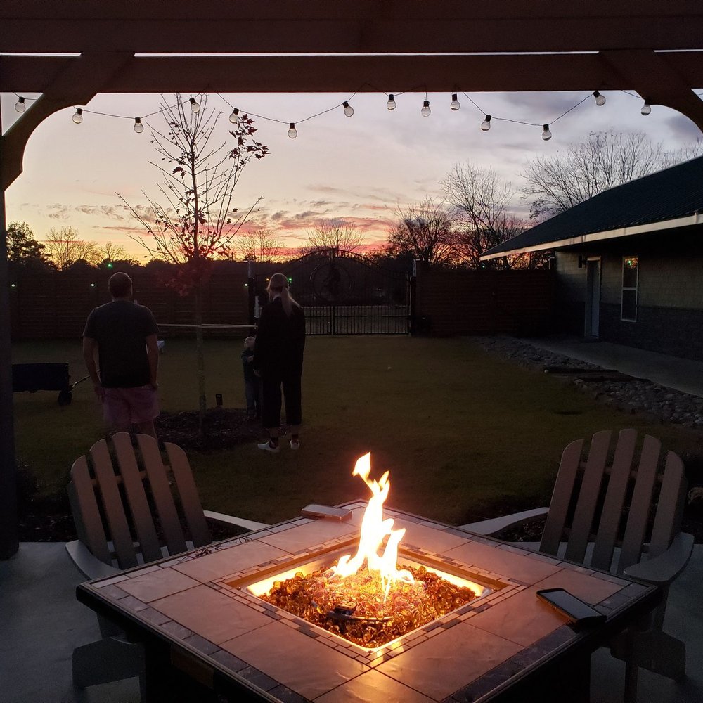 Trailhead Bike and Bed - Nice fire pit outside by the game area that has cornhole. - Venues & Event Spaces Near Me - Houston, Mississippi Trailhead Bike and Bed - Nice fire pit outside by the game area that has cornhole. - Venues & Event Spaces Near Me - Houston, Mississippi