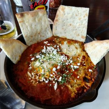 Battle Hill Tavern - Brunch shakshouka, served with foccacia bread. Delicious! - Pizza Near Me - Brooklyn, New York Battle Hill Tavern - Brunch shakshouka, served with foccacia bread. Delicious! - Pizza Near Me - Brooklyn, New York