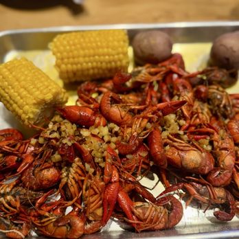 Landmark - Crawfish boil during Mardi Gras - tiny crawdads, no flavor & cold corn. Where's the sausage?!? - Sports Bars Near Me - Addison, Texas
