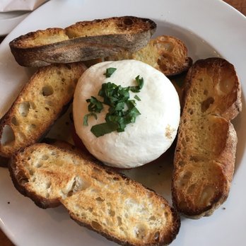 Sorella - Burrata (there's a roasted tomato under there) - Pizza Near Me - Newport, Oregon Sorella - Burrata (there's a roasted tomato under there) - Pizza Near Me - Newport, Oregon