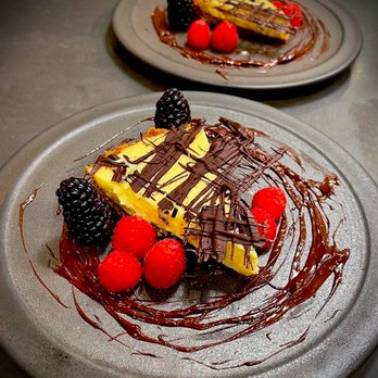 The Fig & The Knife - Our famous Key Lime Pie with Raspberry infused Chocolate. - Food Delivery Services Near Me The Fig & The Knife - Our famous Key Lime Pie with Raspberry infused Chocolate. - Food Delivery Services Near Me