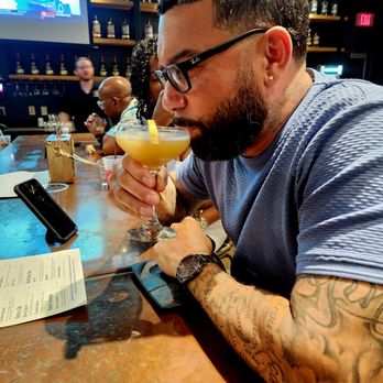 Seven Three Distilling - Hubby sipping - Cocktail Bars Near Me - New Orleans, Louisiana Seven Three Distilling - Hubby sipping - Cocktail Bars Near Me - New Orleans, Louisiana