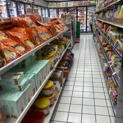 Nilgiris Cash And Carry - L-breads.. R-cookies, snacks ..rear: frozen goods