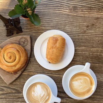 Le Coffee Shop - Chocolate croissant, orange pastry, and a moccachino & rose vanilla latte - Breakfast & Brunch Near Me - Temecula, California Le Coffee Shop - Chocolate croissant, orange pastry, and a moccachino & rose vanilla latte - Breakfast & Brunch Near Me - Temecula, California