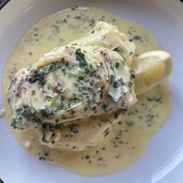 Doyle's hand-smoked haddock, poached in milk with onions and white cheddar mash