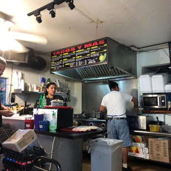 Tacos Y Mas - two people working in a restaurant - Mexican Near Me - Canton, Texas