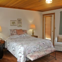 Relax in the master bedroom after a solid day of adventure, and in the morning, enjoy your coffee on the private deck.