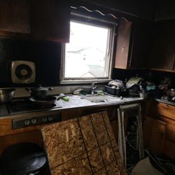 Accela Public Adjusting - Heavy fire damaged kitchen in New York.