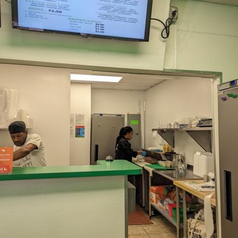 What's The Dill - two people working in a restaurant - Delis Near Me - Detroit, Michigan What's The Dill - two people working in a restaurant - Delis Near Me - Detroit, Michigan