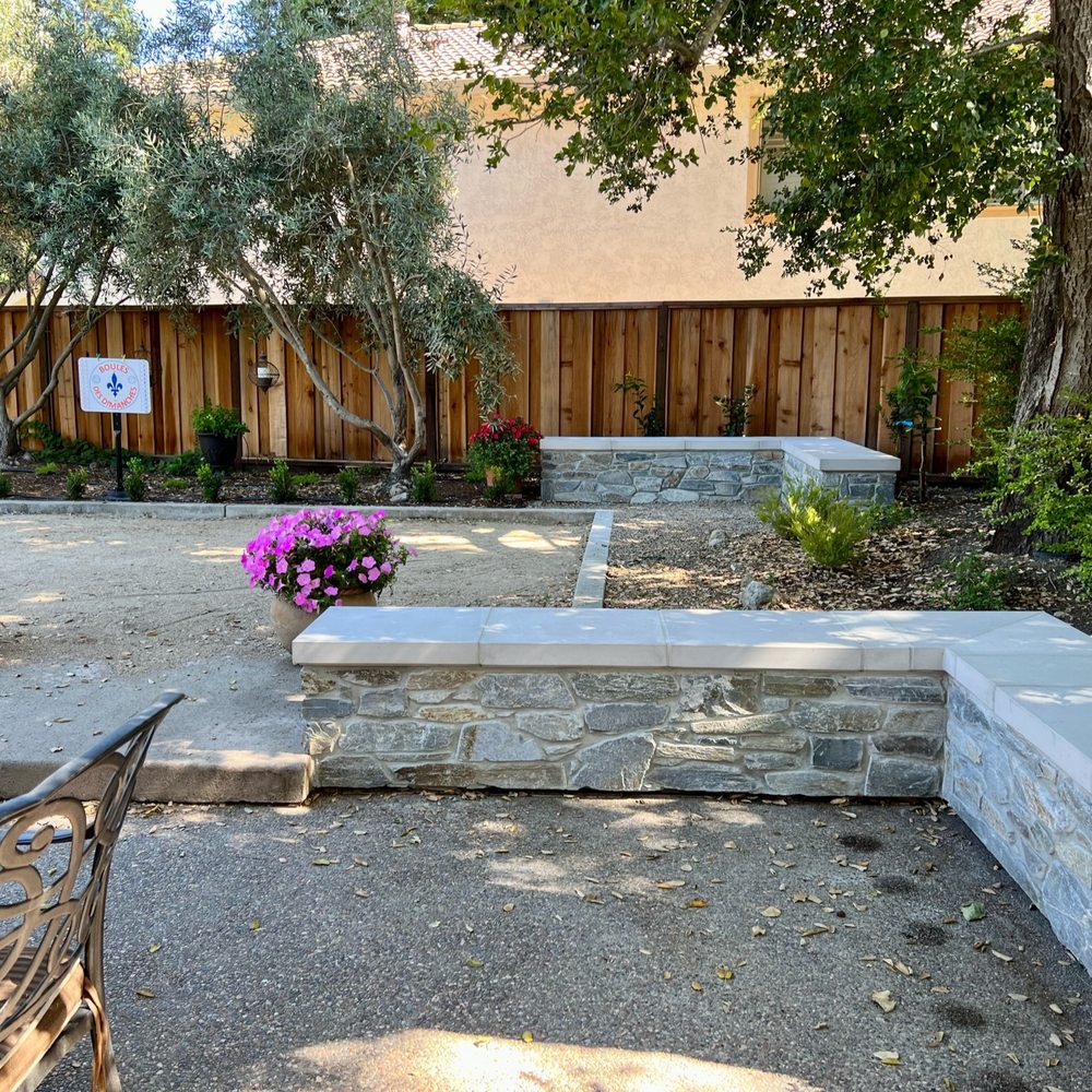 AG & Associates - After picture of walls capped by AG & Associates - Landscaping Near Me