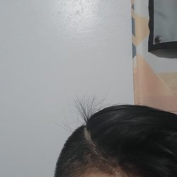 A Fullerton Barber Shop - He accidentally cut a bunch of long hair on the back and gel it together. a bunch of hair came off when I showered