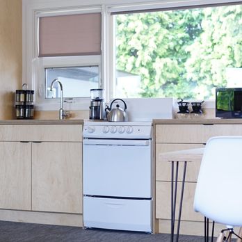 Heliotrope Hotel - Full kitchen in the Cascade Room with custom cabinetry. - Hotels Near Me - Bellingham, Washington Heliotrope Hotel - Full kitchen in the Cascade Room with custom cabinetry. - Hotels Near Me - Bellingham, Washington