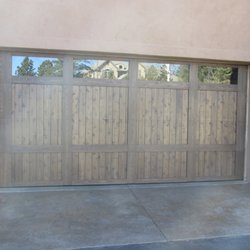 Happy Painting - These custom garage doors were done with Benjamin Moore's Arborcoat Exterior Stain.