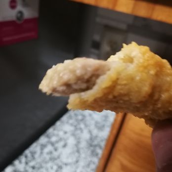 Dairy Queen - a hand holding a half eaten pastry - Fast Food Near Me - Houston, Texas Dairy Queen - a hand holding a half eaten pastry - Fast Food Near Me - Houston, Texas