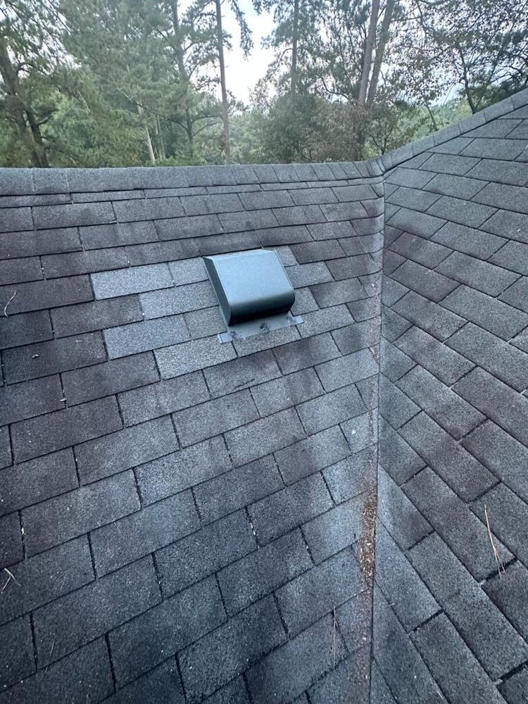Slide of Ricky's Roofing