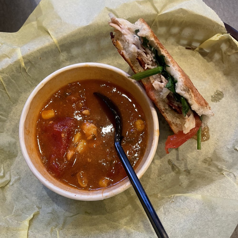 a bowl of soup and a sandwich a bowl of soup and a sandwich