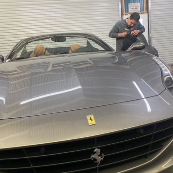Matrix Auto Glass and Tint - Charlie applying Vortex IR nano ceramic tint to Ferrari @ Matrix Auto Glass and Tint - Auto Glass Services Near Me - Tucson, Arizona