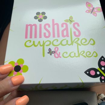 Misha's Cupcakes - a hand holding a box of cupcakes - Bakeries Near Me - Miami, Florida Misha's Cupcakes - a hand holding a box of cupcakes - Bakeries Near Me - Miami, Florida