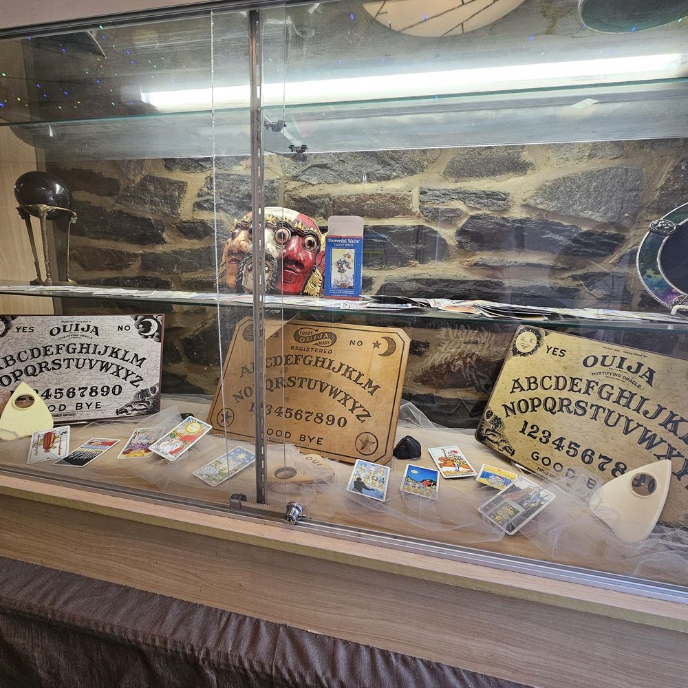 Crystal Candles & Cauldrons - Ouija boards by the entrance. - Jewelry Near Me - Baltimore, Maryland