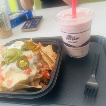 Del Taco - Loaded queso nachos with Strawberry milkshake made with real strawberries - Fast Food Near Me - Titusville, Florida Del Taco - Loaded queso nachos with Strawberry milkshake made with real strawberries - Fast Food Near Me - Titusville, Florida