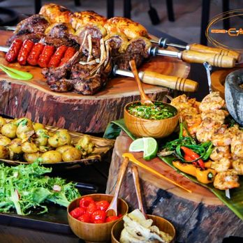 Carvao - Picanha, Linguica, Pollo asado, Lamb chops, Shrimp, Grilled potatoes, pickled peppers, this could be your table! - Caterers Near Me Carvao - Picanha, Linguica, Pollo asado, Lamb chops, Shrimp, Grilled potatoes, pickled peppers, this could be your table! - Caterers Near Me