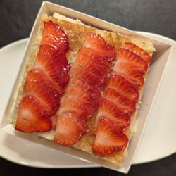 Main Street Cafe - The strawberry shortcake is incredible. Thin layers of strawberry and cream are sandwiched between layers of vanilla cake.