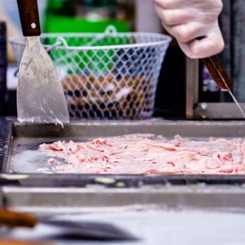 Roll'n Chill - a person cutting meat with a knife - Ice Cream & Frozen Yogurt Near Me - Brooklyn, New York Roll'n Chill - a person cutting meat with a knife - Ice Cream & Frozen Yogurt Near Me - Brooklyn, New York