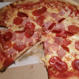 a half eaten pizza in a box a half eaten pizza in a box