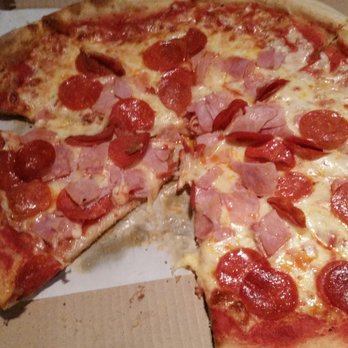 Pizza Town - a half eaten pizza in a box - Pizza Near Me - Milton, Pennsylvania Pizza Town - a half eaten pizza in a box - Pizza Near Me - Milton, Pennsylvania