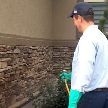 Guardian Pest Control - Technician servicing home in highland, UT - Pest Control Near Me - Springville, Utah
