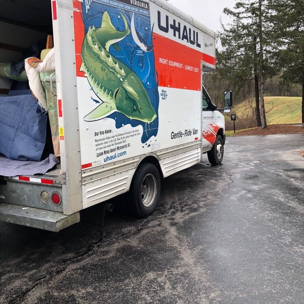 Helping Hand Movers - Had to unload PODS onto a truck to get them closer to the apartment. - Movers Near Me