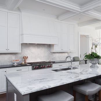 MSI - a white kitchen with a marble island - Flooring Near Me - Dulles, Virginia MSI - a white kitchen with a marble island - Flooring Near Me - Dulles, Virginia