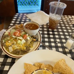 The Daily Grind on the Go - Stacked Enchiladas (beef, chicken, & cheese) with rice and pinto beans-more than you can eat!