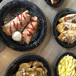 Strawberry crepes, potatoes, caramelized banana French toast, chicken sausage, eggs Strawberry crepes, potatoes, caramelized banana French toast, chicken sausage, eggs
