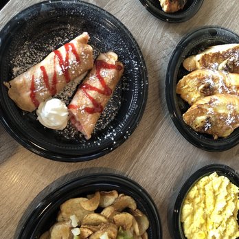 Le Petit Dejeuner - Strawberry crepes, potatoes, caramelized banana French toast, chicken sausage, eggs - Breakfast & Brunch Near Me - Detroit, Michigan Le Petit Dejeuner - Strawberry crepes, potatoes, caramelized banana French toast, chicken sausage, eggs - Breakfast & Brunch Near Me - Detroit, Michigan