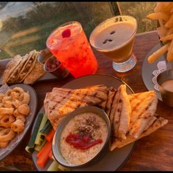 The Venice Whaler - Hummus with Flat Bread, Crispy Calamari, World Famous Fish Tacos, House Fries