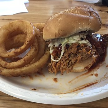 Gio's BBQ - Pork BBQ sandwich with coleslaw and onion rings. - Barbeque Near Me - Woodland, Pennsylvania Gio's BBQ - Pork BBQ sandwich with coleslaw and onion rings. - Barbeque Near Me - Woodland, Pennsylvania