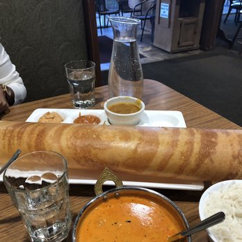 Hyderabadi Biryani House - Ghee roast dosa and butter chicken (front) - Indian Near Me - Omaha, Nebraska Hyderabadi Biryani House - Ghee roast dosa and butter chicken (front) - Indian Near Me - Omaha, Nebraska