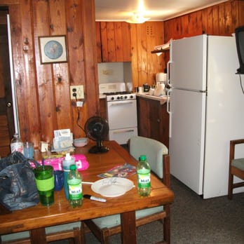 Pineview Military Surplus - table and kitchen.  TV has a digital converter. - Military Surplus Near Me - Grayling, Michigan