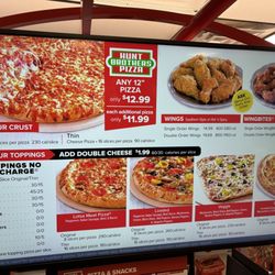 Mobil - Jordan's Kwik Stop #3 makes Hunt Brothers pizzas here, to order.