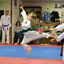 Anderson School of Tae Kwon DO - High flyin' jump kick during the May 2014 Belt Test