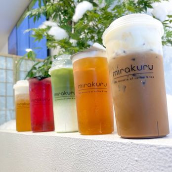 Mirakuru - L to R: Kurimi Camellia, Mirakuru Moonlight, White Chocolate Matcha, Fuji Apple Oolong, and Coffee w/ Korean Bannana Foam - Coffee & Tea Near Me - Garden Grove, California Mirakuru - L to R: Kurimi Camellia, Mirakuru Moonlight, White Chocolate Matcha, Fuji Apple Oolong, and Coffee w/ Korean Bannana Foam - Coffee & Tea Near Me - Garden Grove, California