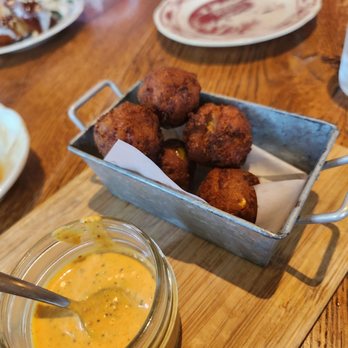 Ida Claire - Crawfish corn beignets with delicious mustard remoulade - Southern Near Me - Addison, Texas Ida Claire - Crawfish corn beignets with delicious mustard remoulade - Southern Near Me - Addison, Texas