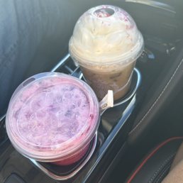 two cups of ice cream in a cup holder
